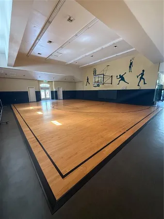 a room with gym equipment and appliances