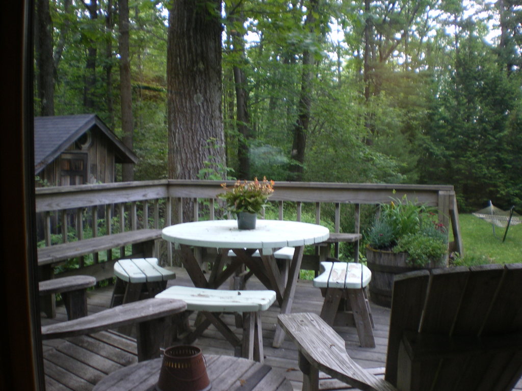 10 Norwalk Acres Road Monterey, MA 01245 - Photo 2 of 9 a view of a table and chairs in the roof deck