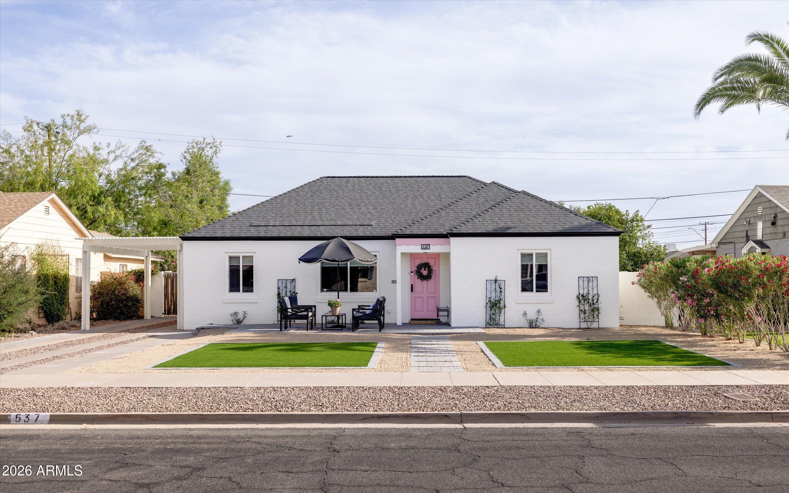 537 Virginia Avenue Phoenix, AZ 85003 - Photo 1 of 32 a front view of house with yard and green space
