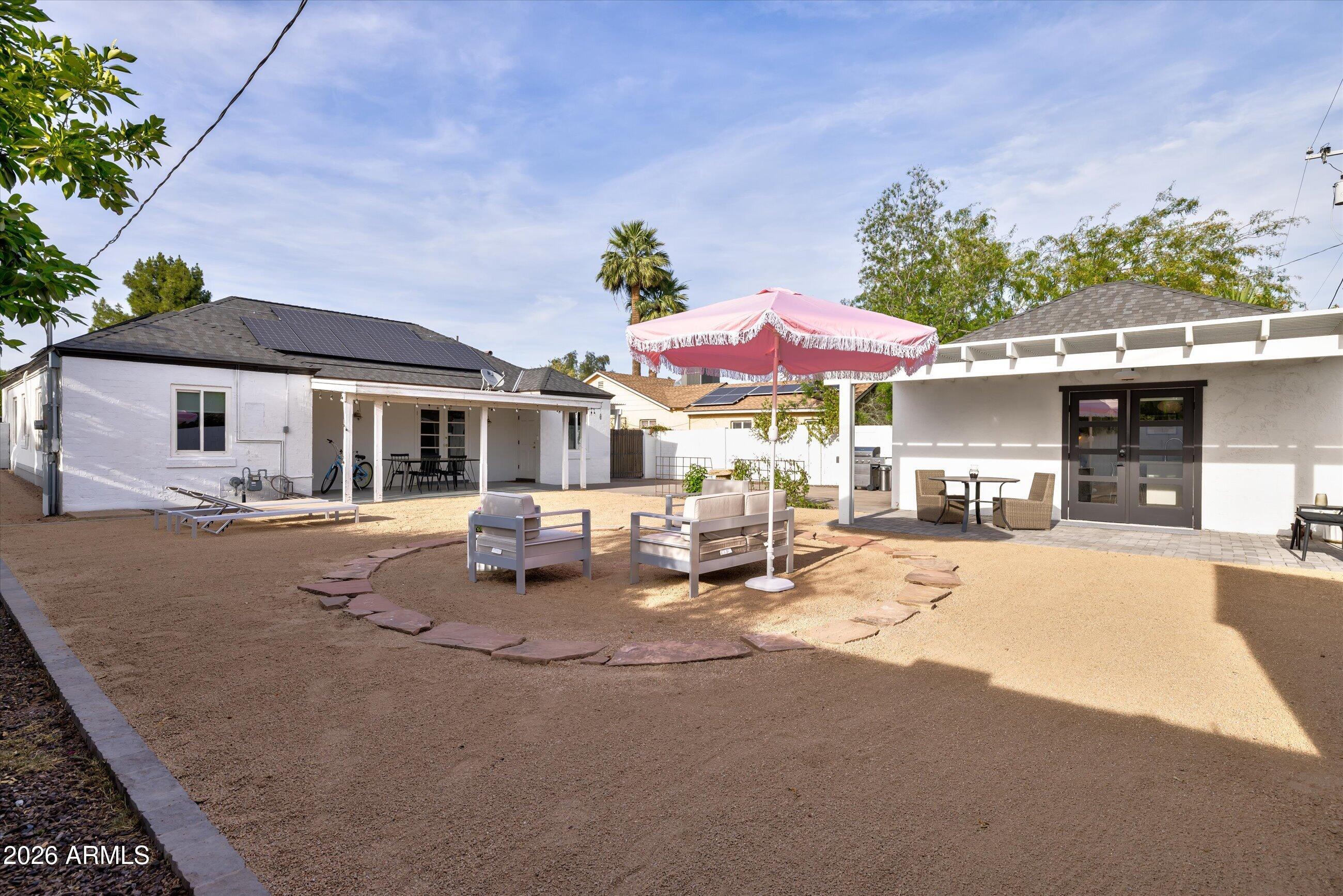 537 Virginia Avenue Phoenix, AZ 85003 - Photo 20 of 32 a view of a house with sitting area and garden