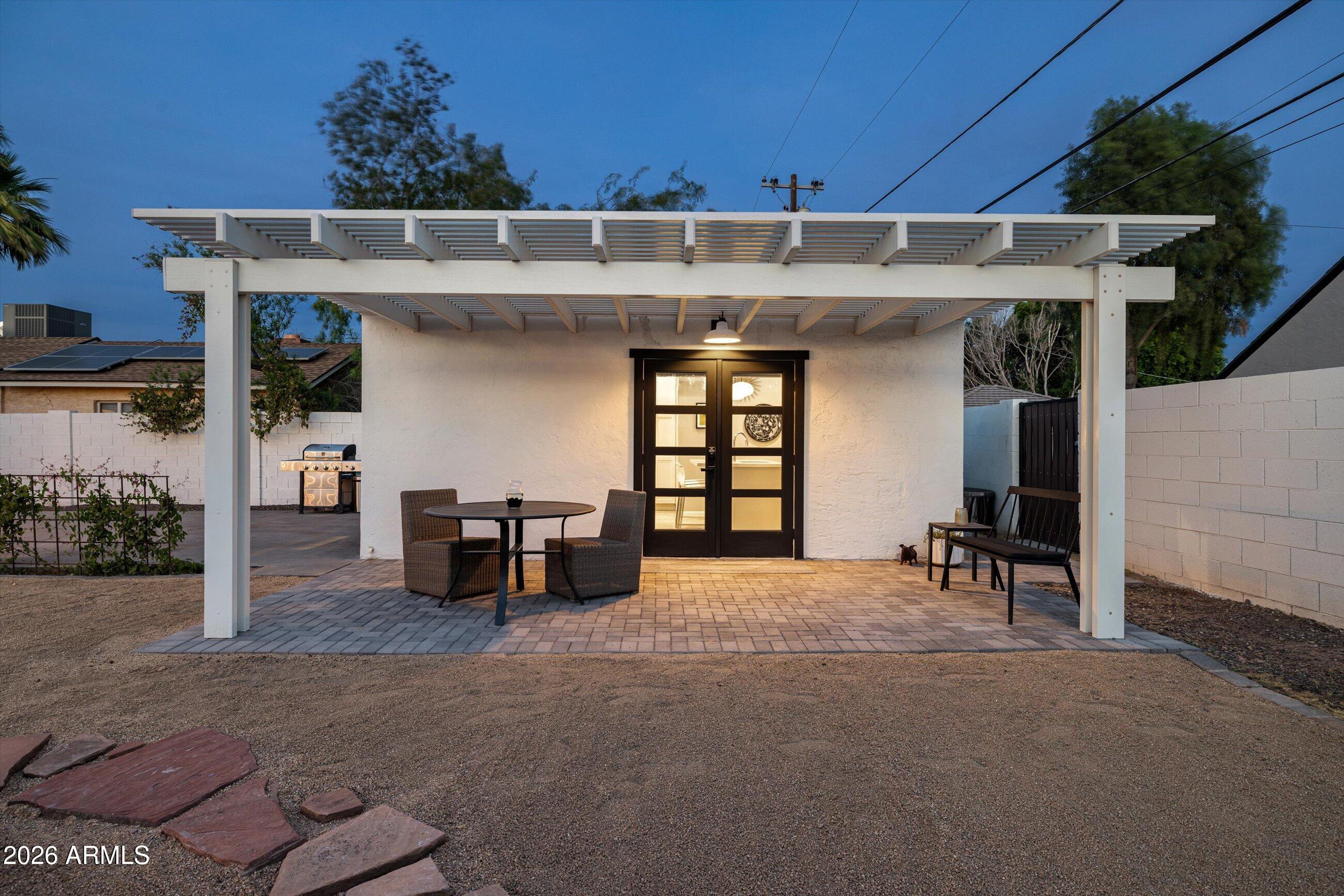 537 Virginia Avenue Phoenix, AZ 85003 - Photo 23 of 32 a view of a house with a porch and furniture