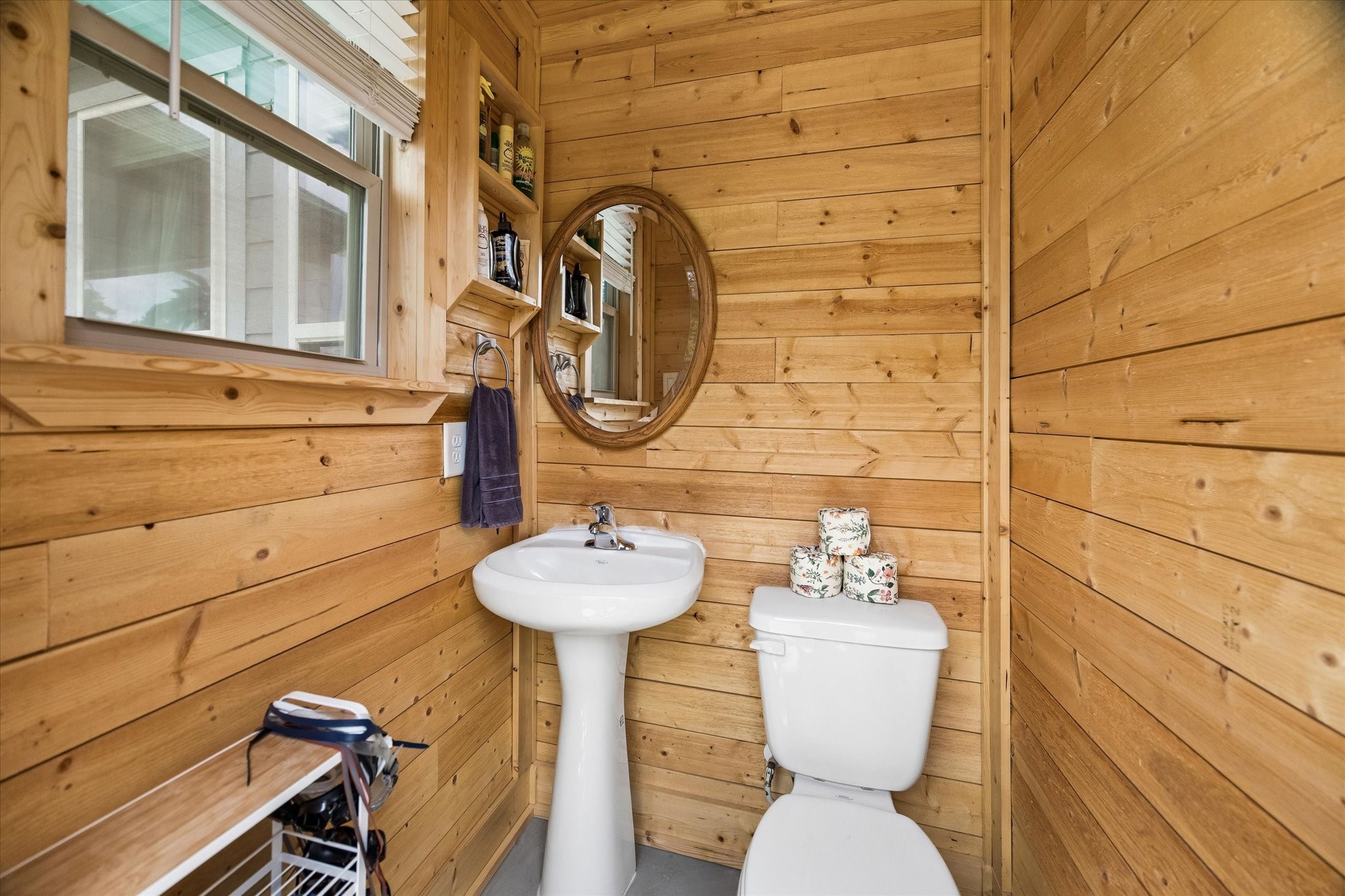 5935 Dovershire Knoll Court Spring, TX 77389 - Photo 26 of 34 a bathroom with a sink and mirror with bathtub