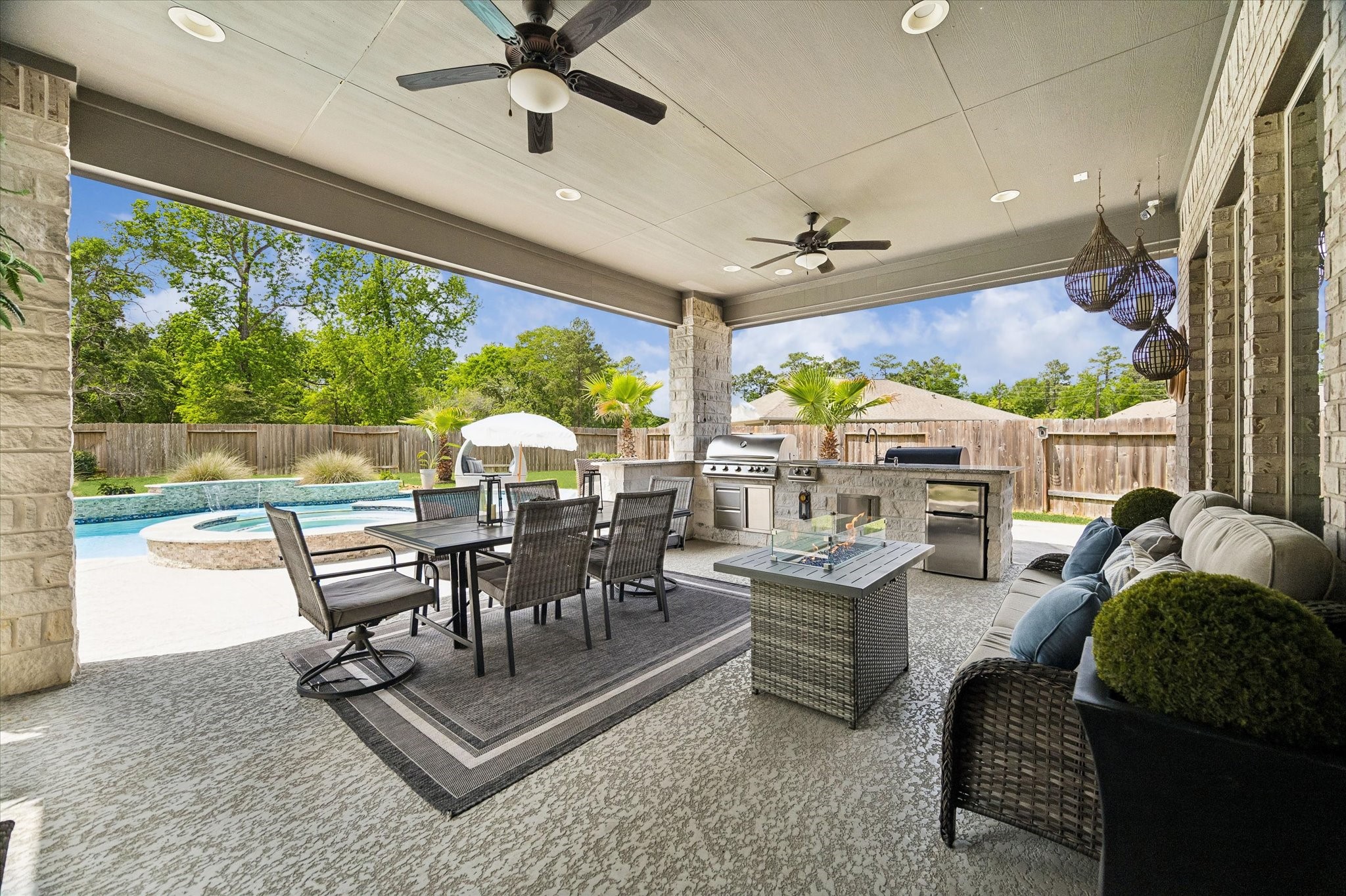 5935 Dovershire Knoll Court Spring, TX 77389 - Photo 27 of 34 a living room with furniture and a large window