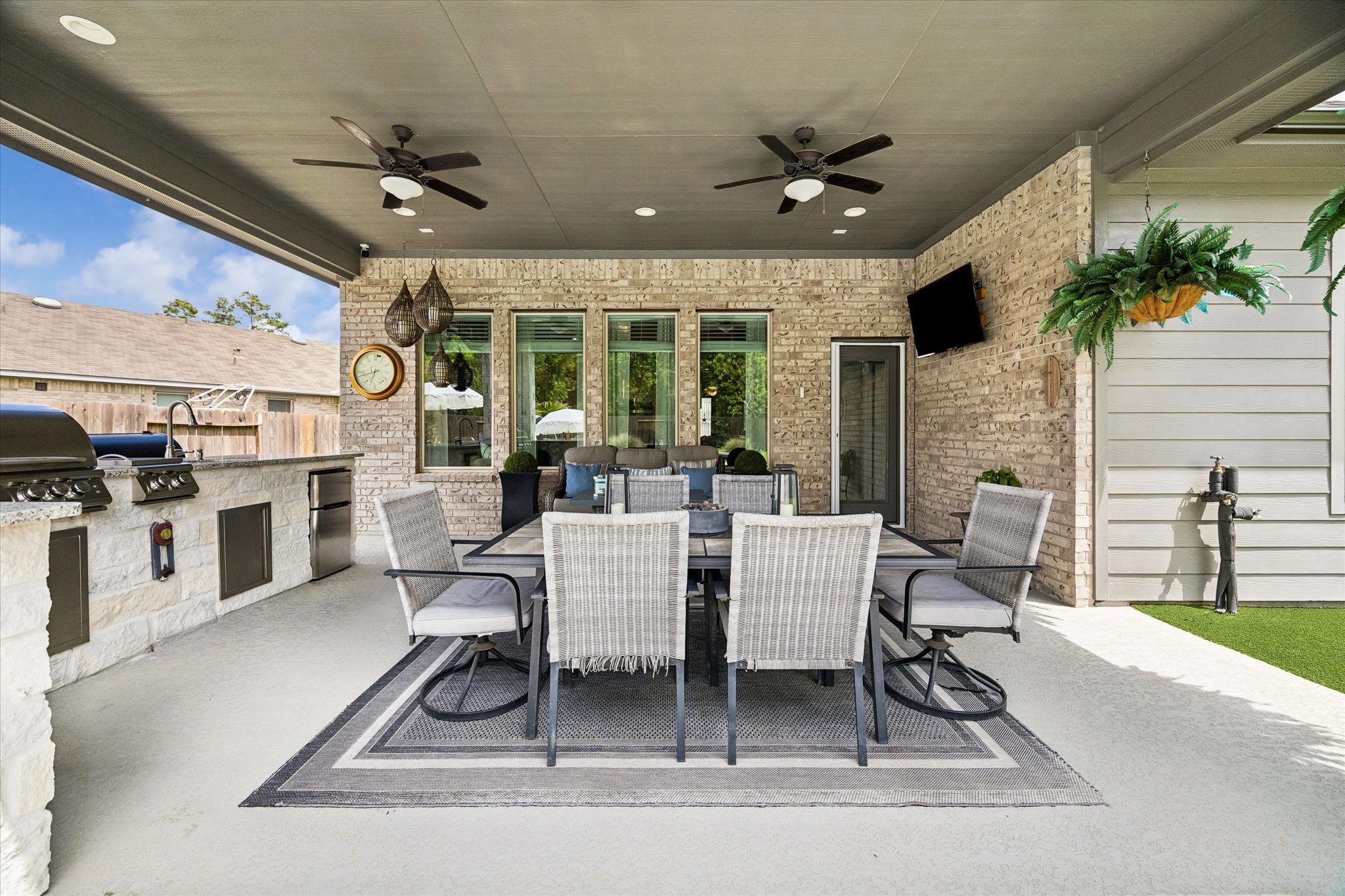 5935 Dovershire Knoll Court Spring, TX 77389 - Photo 29 of 34 a dining room with furniture a rug and a large window