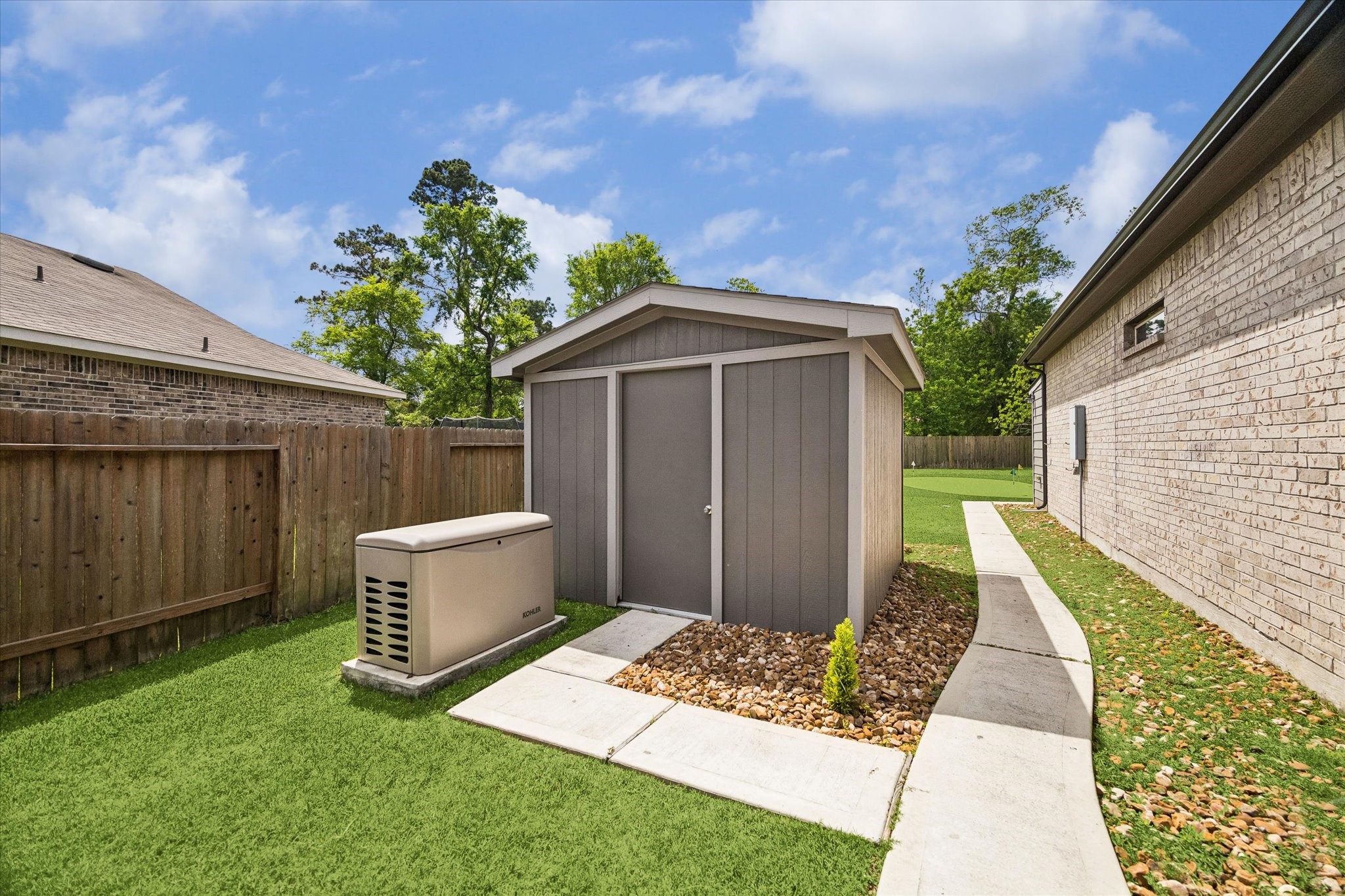 5935 Dovershire Knoll Court Spring, TX 77389 - Photo 33 of 34 a front view of house with yard