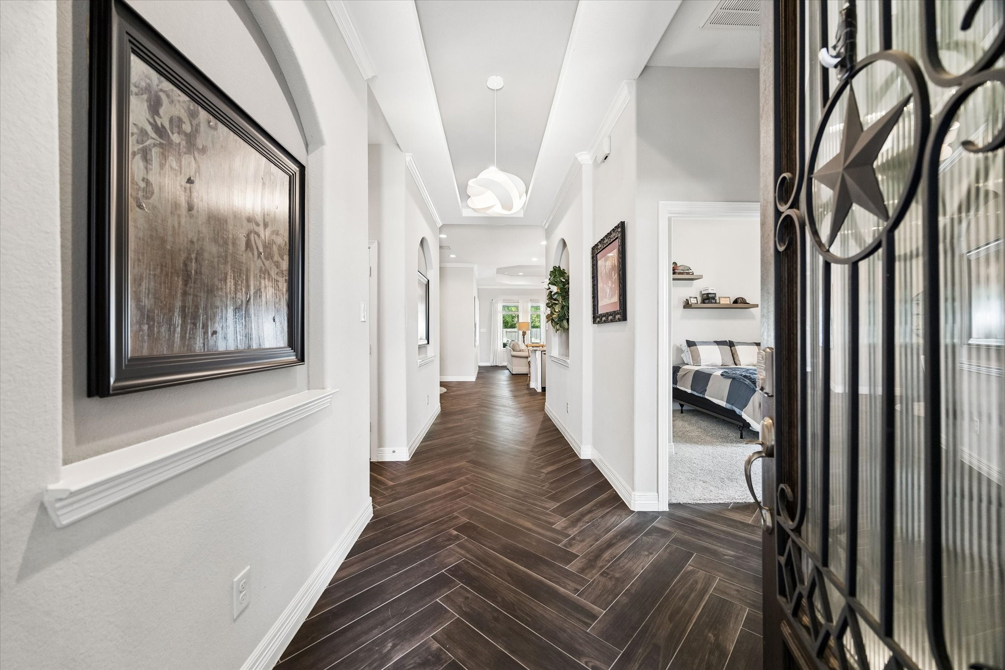 5935 Dovershire Knoll Court Spring, TX 77389 - Photo 5 of 34 a view of a hallway with wooden floor and stairs