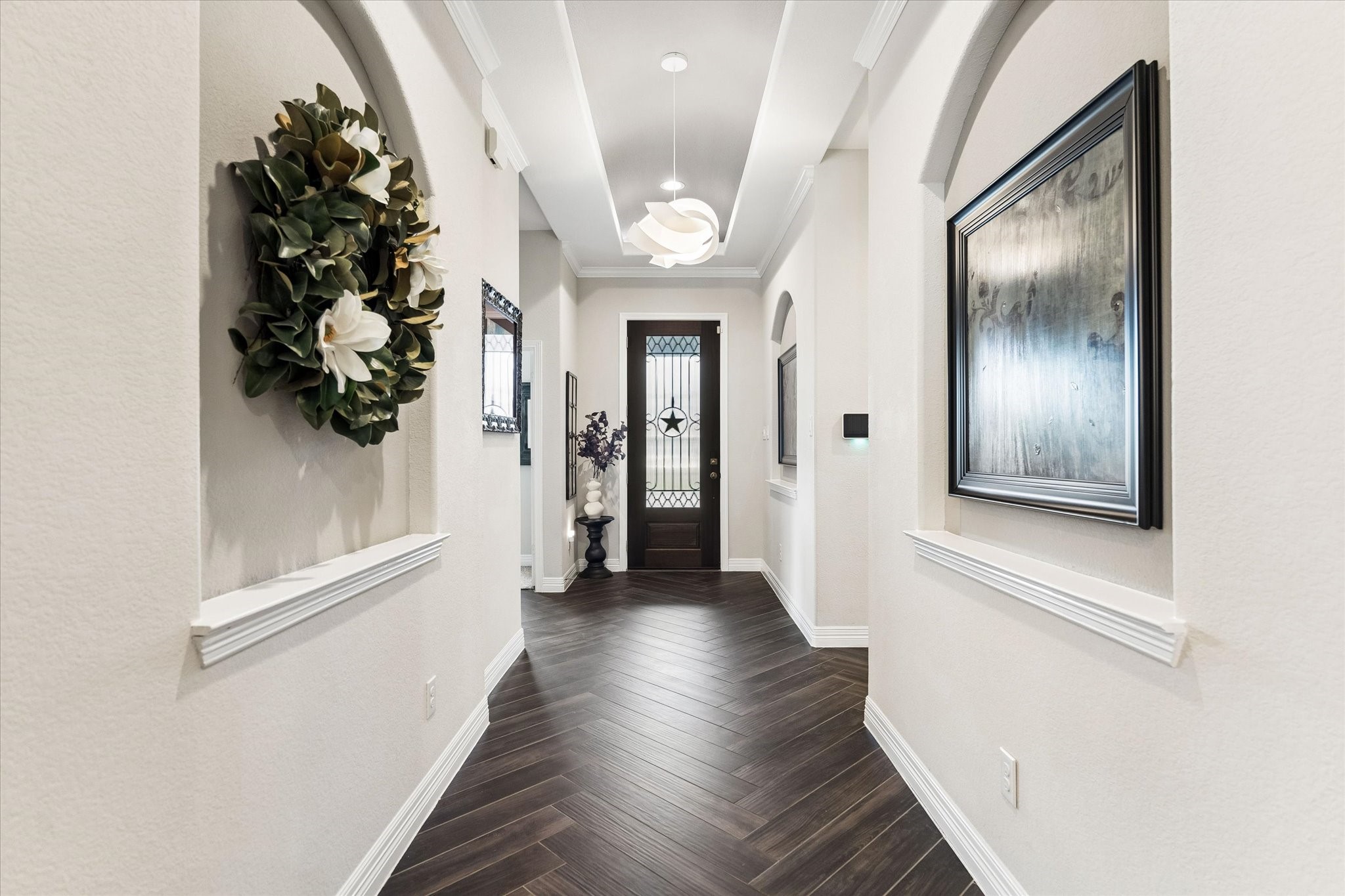 5935 Dovershire Knoll Court Spring, TX 77389 - Photo 6 of 34 a view of a hallway with wooden floor and entryway