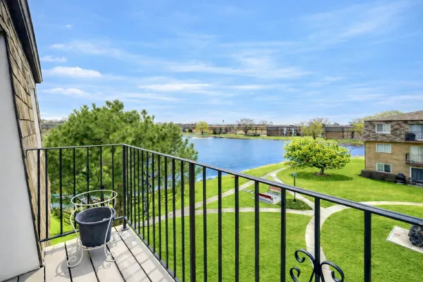 a view of a balcony with lake view