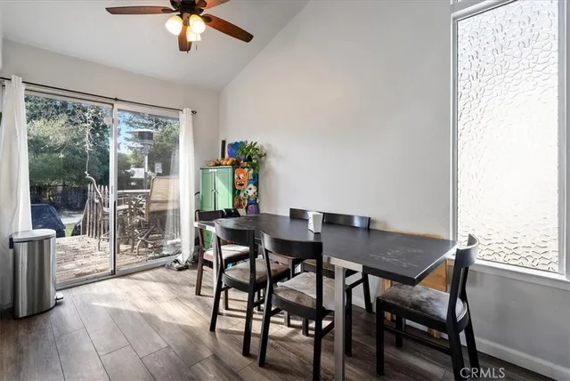 a living room with furniture and a lamp