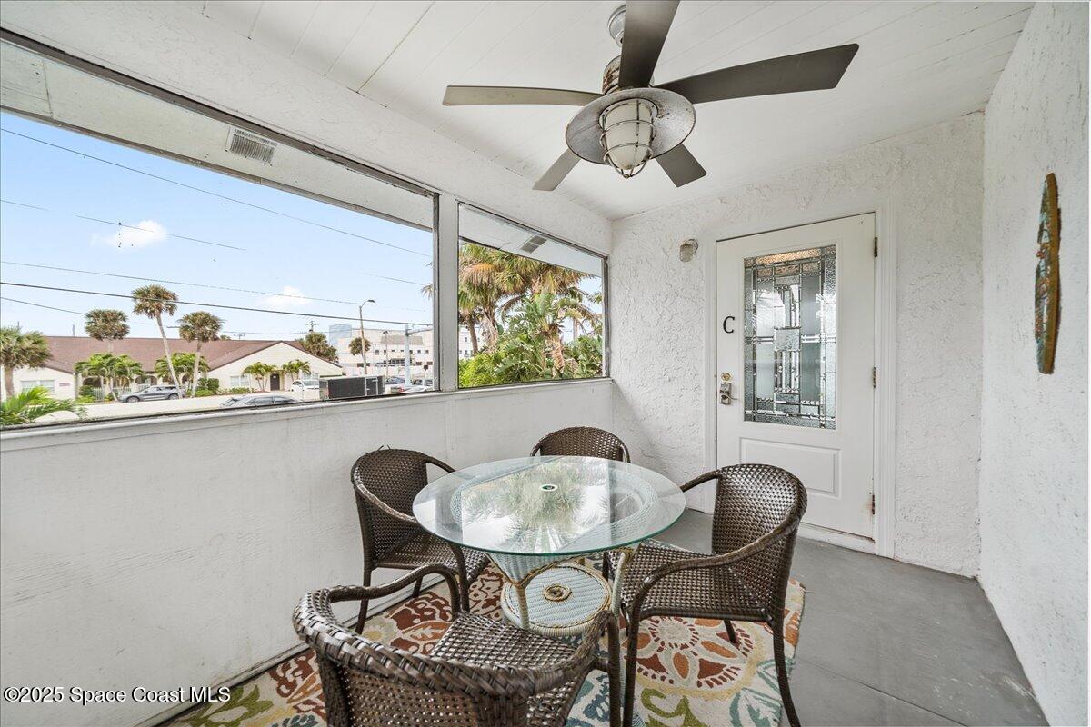 111 South Atlantic Avenue Cocoa Beach, FL 32931 - Photo 30 of 71 a dining room with furniture and window