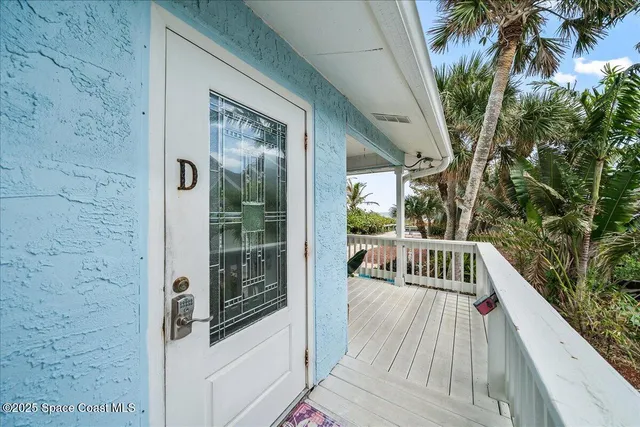 a front view of a house with a porch