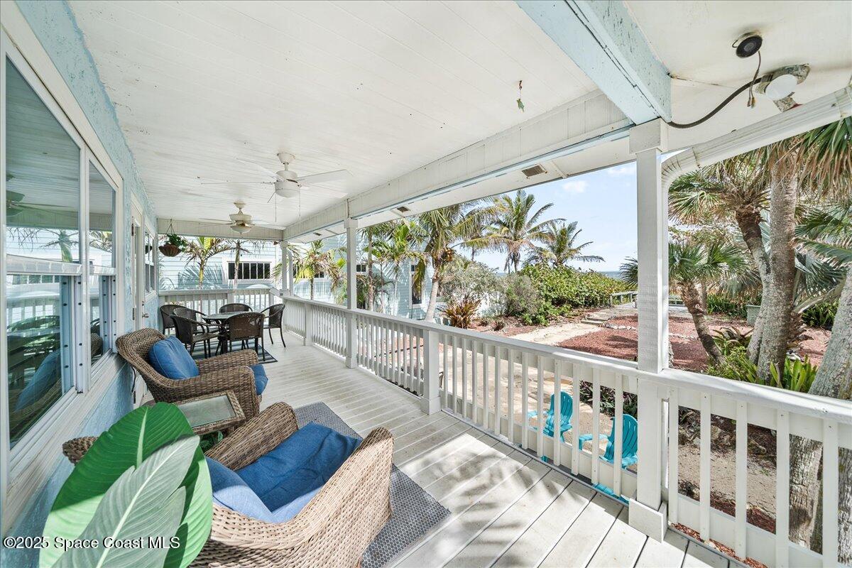 111 South Atlantic Avenue Cocoa Beach, FL 32931 - Photo 48 of 71 a living room with large windows
