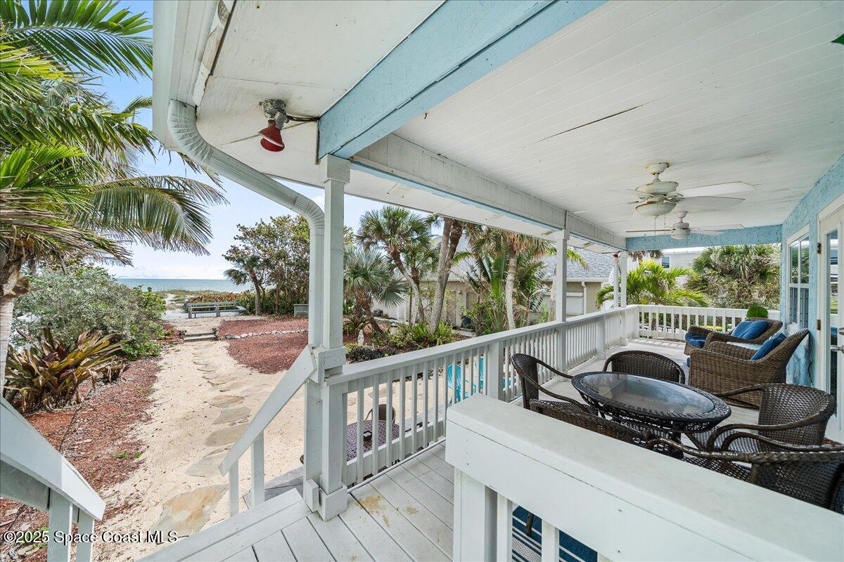 111 South Atlantic Avenue Cocoa Beach, FL 32931 - Photo 49 of 71 a balcony with furniture and a potted plant