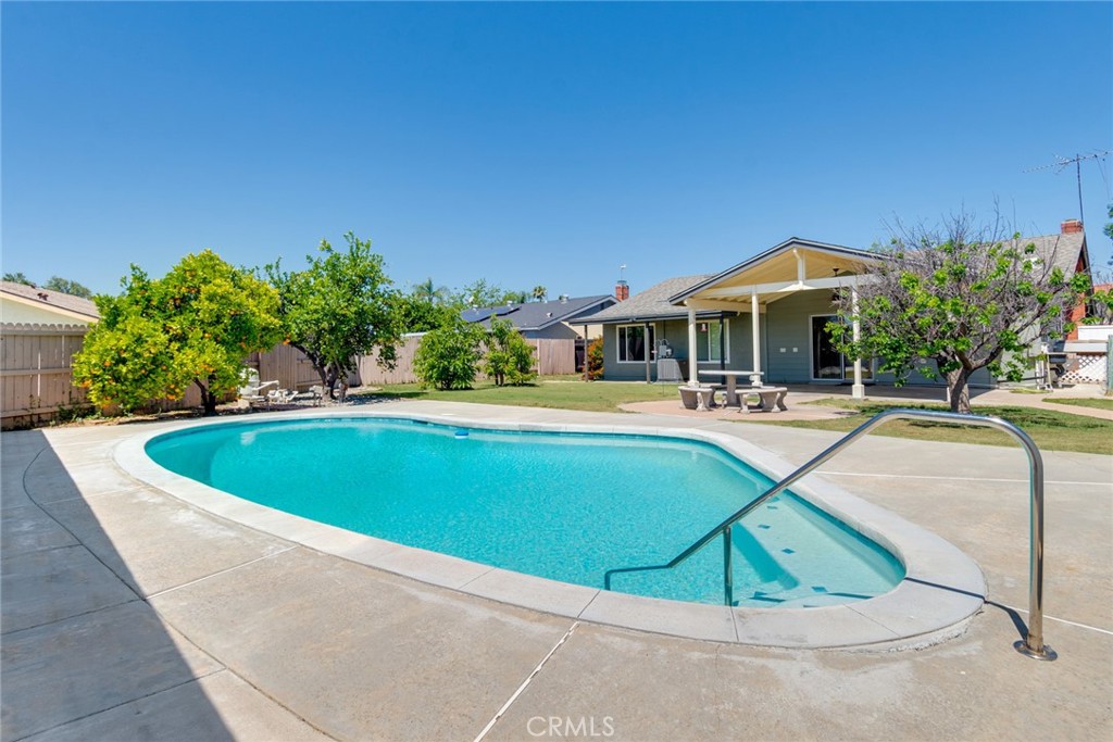 9130 Duncan Avenue Riverside, CA 92503 - Photo 28 of 34 a view of outdoor space yard swimming pool and patio