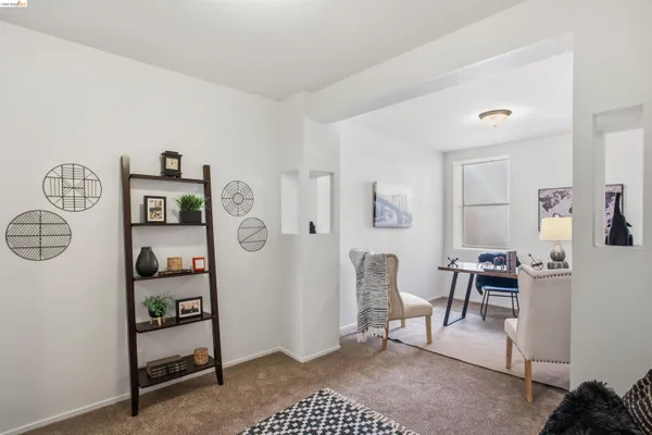 a view of a livingroom with furniture