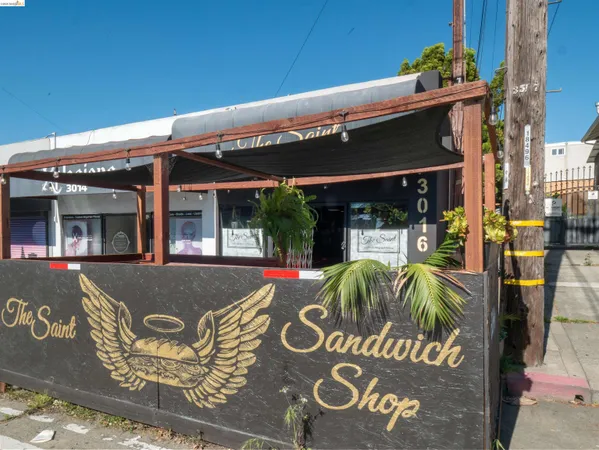 a front view of a building with an outdoor space