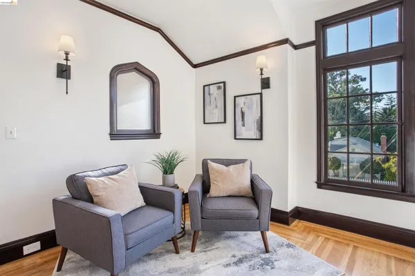 a living room with furniture and windows