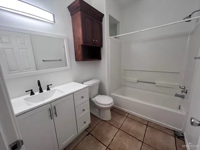 a bathroom with a sink toilet and vanity