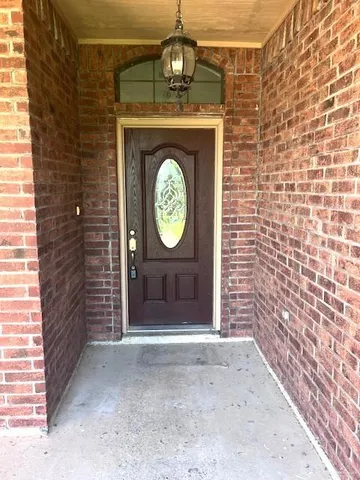 a view of a door with a sink