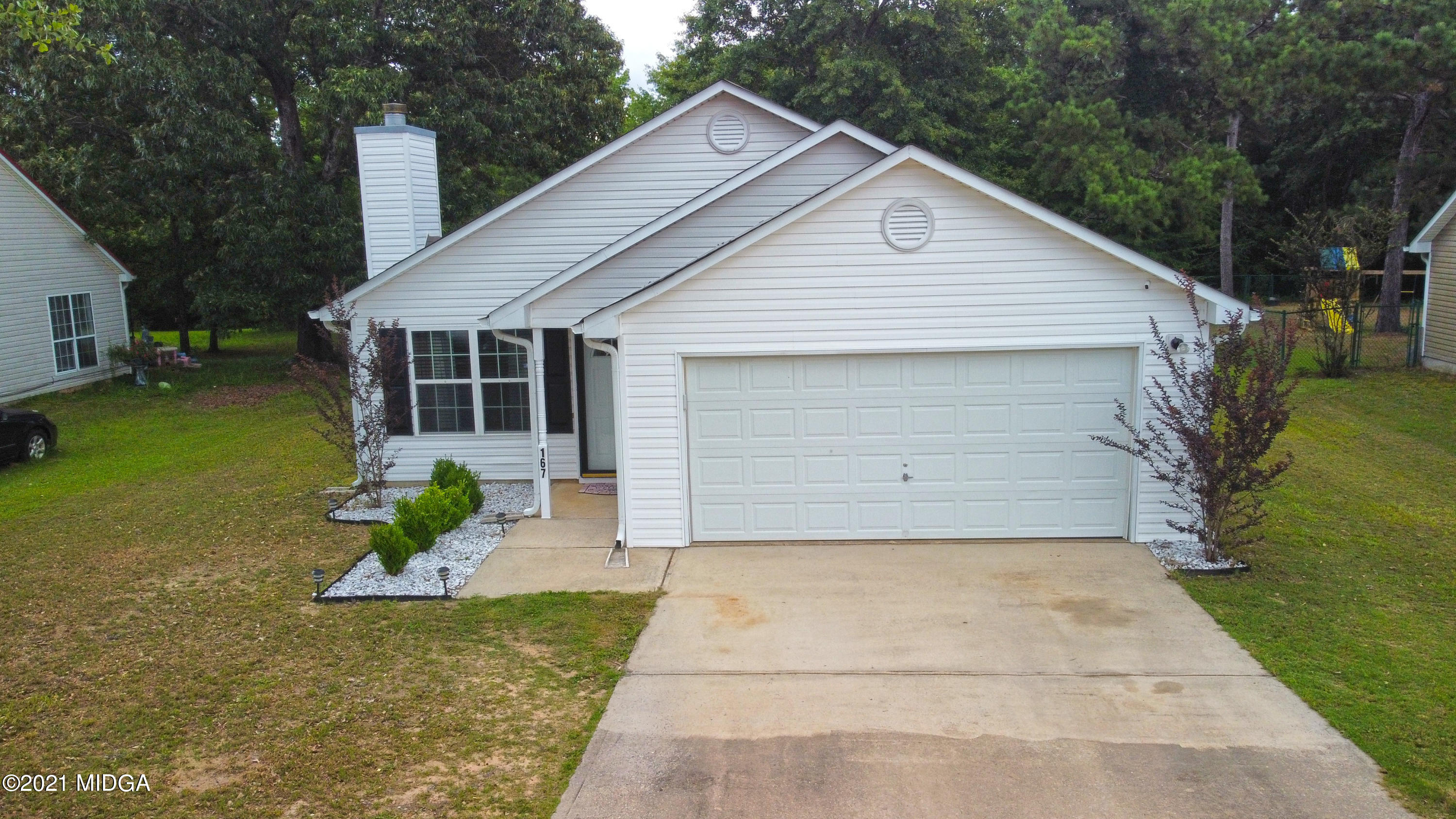 167 Apple Valley Road Macon, GA 31217 - Photo 2 of 25 a front view of house with yard and green space