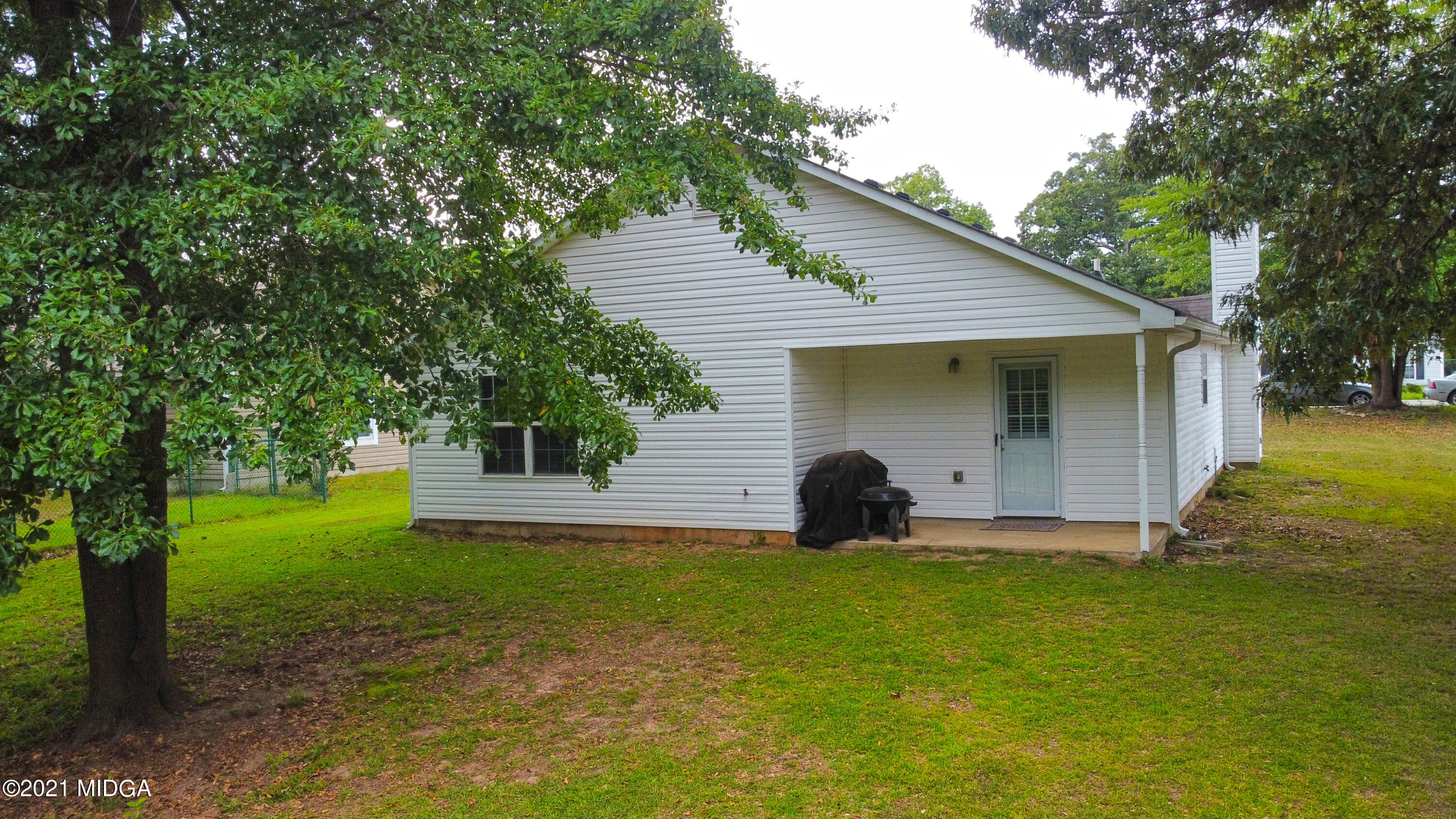 167 Apple Valley Road Macon, GA 31217 - Photo 25 of 25 a house view with a garden space