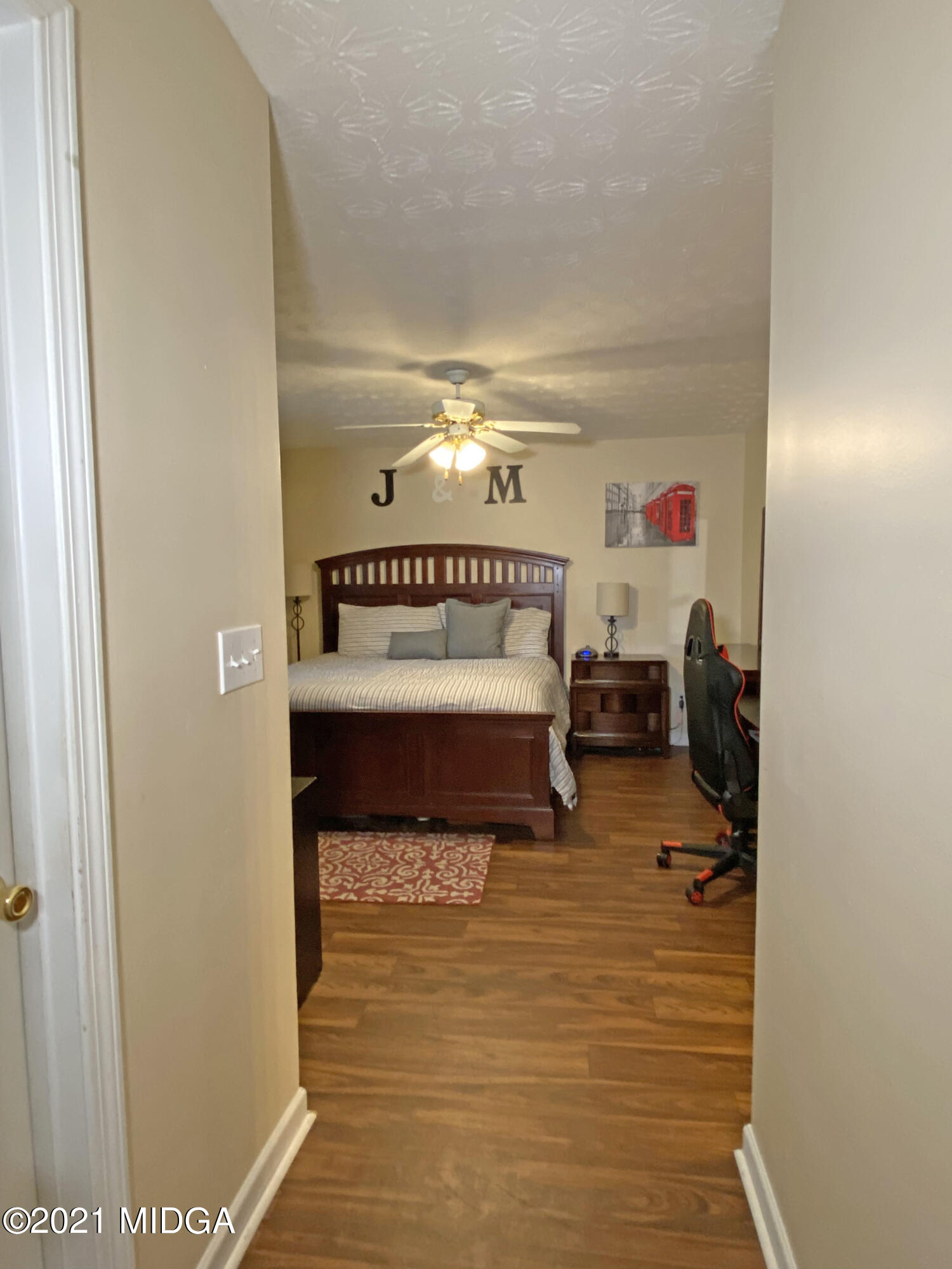167 Apple Valley Road Macon, GA 31217 - Photo 10 of 25 a room with a bed and a dresser