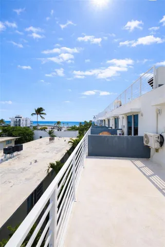 a view of a terrace with chairs