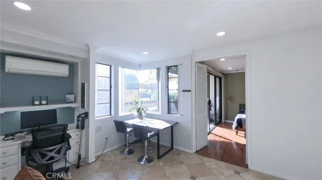 a bed room with a bed and a painting