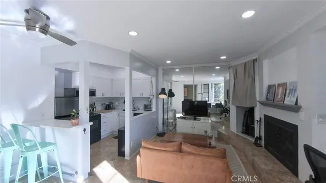 a bed sitting in a room next to a window