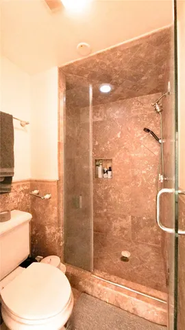 a view of a backyard with table and chairs