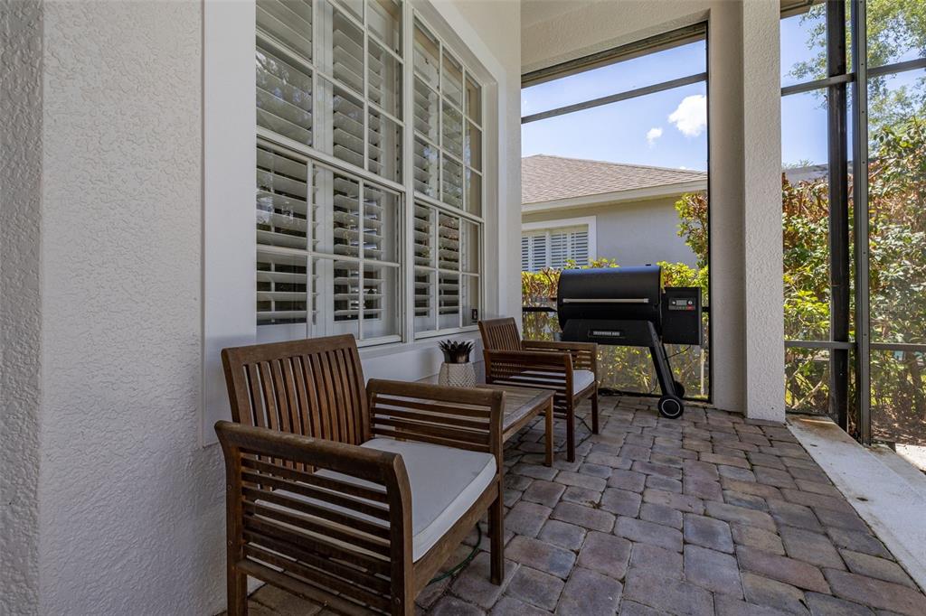 8351 Bowden Way Windermere, FL 34786 - Photo 41 of 71 a view of a balcony with chairs and wooden floor