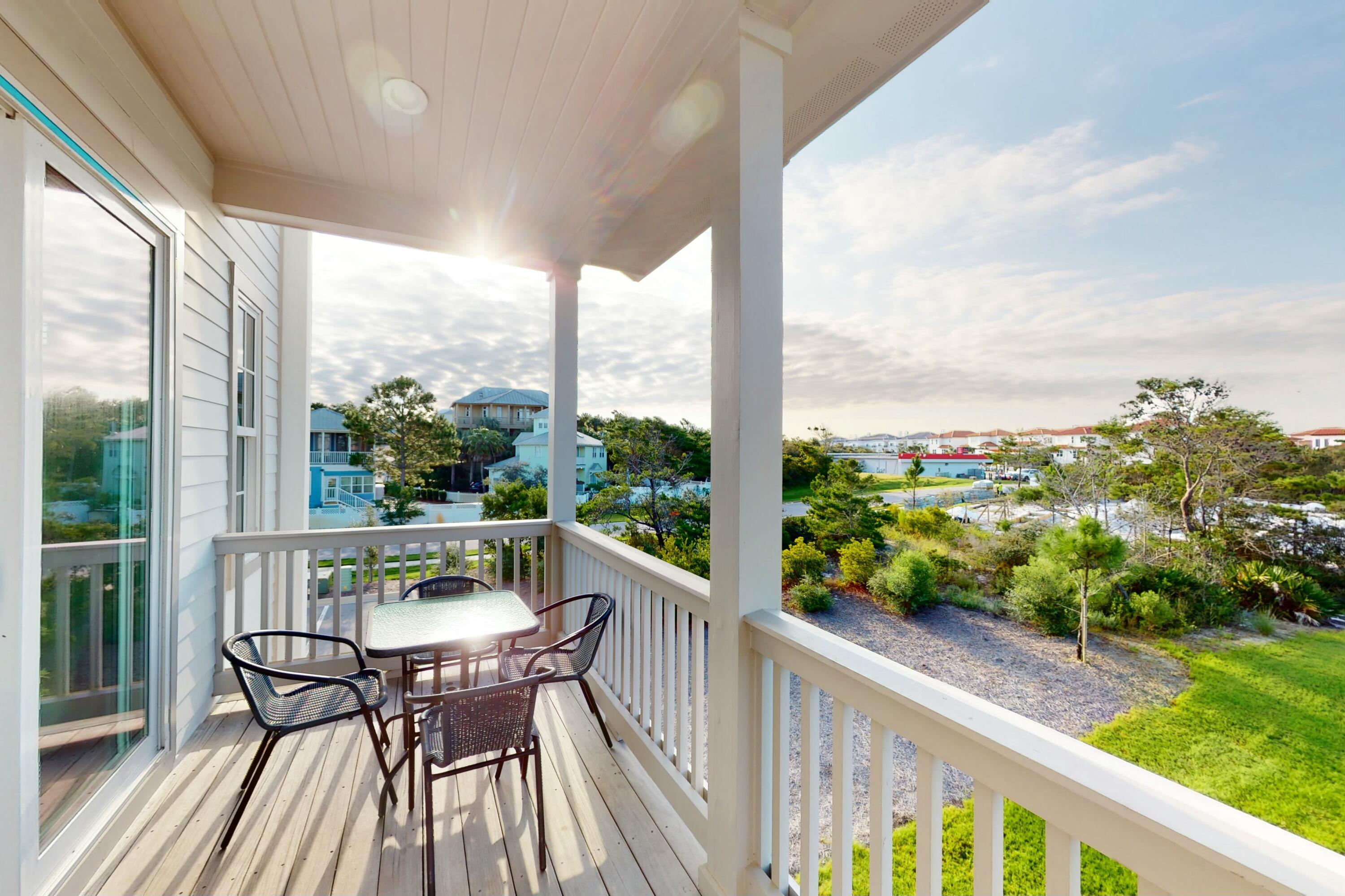 70 Marthas Lane, Unit 2201 Santa Rosa Beach, FL 32459 - Photo 16 of 28 a view of a balcony with chairs and wooden floor
