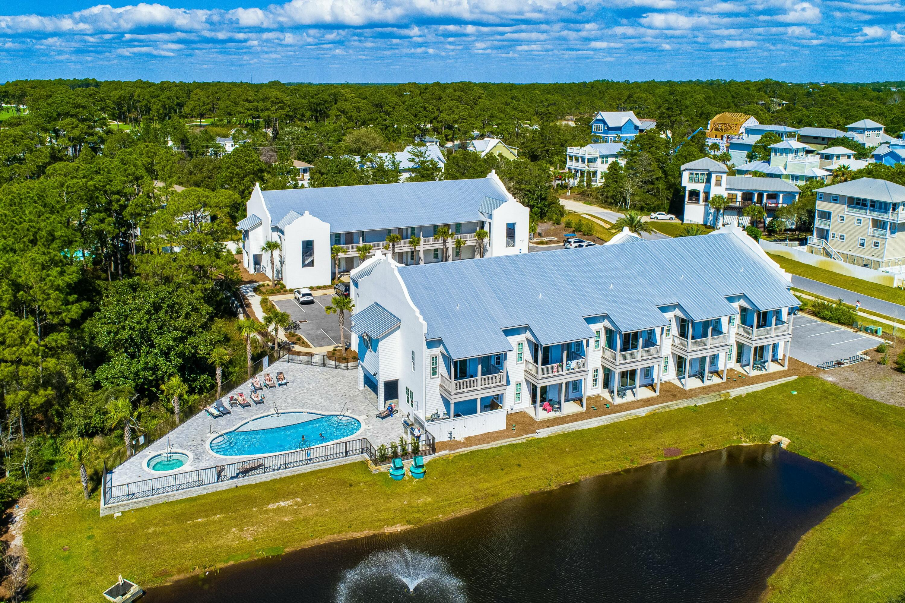 70 Marthas Lane, Unit 2201 Santa Rosa Beach, FL 32459 - Photo 2 of 28 an aerial view of residential houses with outdoor space and swimming pool