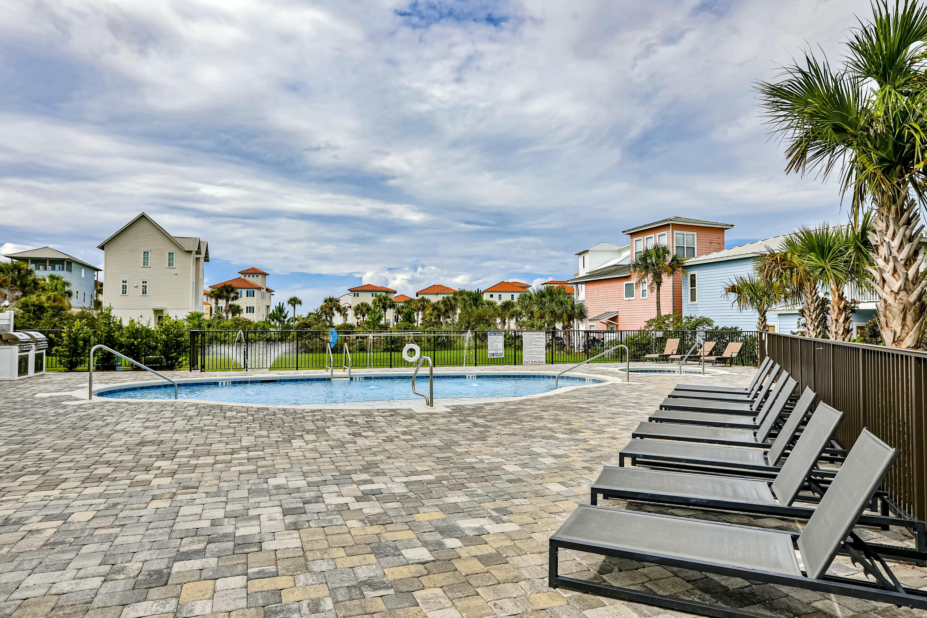 70 Marthas Lane, Unit 2201 Santa Rosa Beach, FL 32459 - Photo 26 of 28 a view of a yard and front view of a house