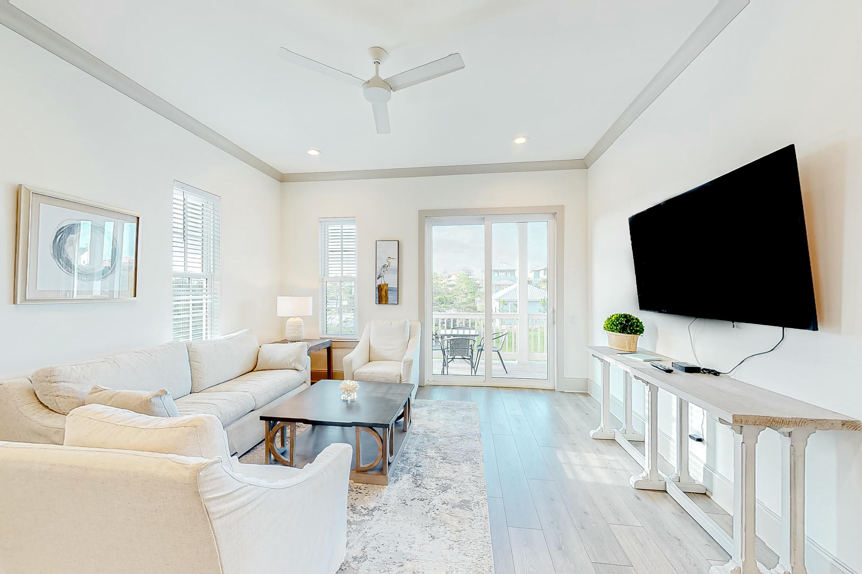 70 Marthas Lane, Unit 2201 Santa Rosa Beach, FL 32459 - Photo 9 of 28 a living room with furniture and a flat screen tv