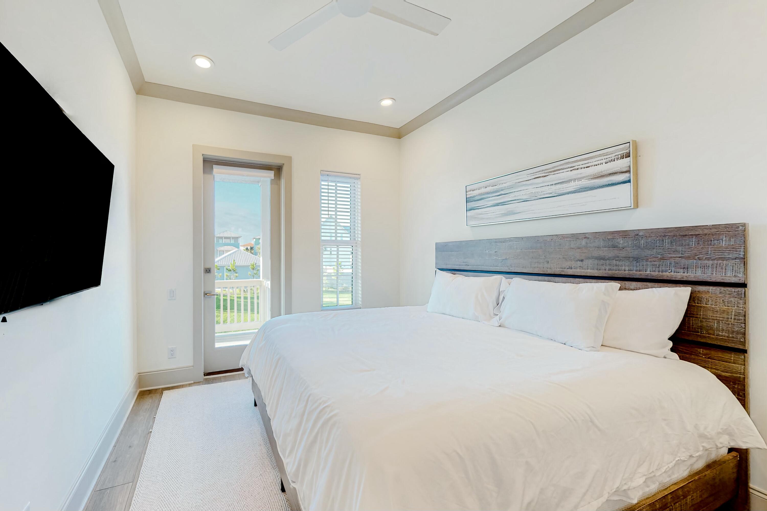 70 Marthas Lane, Unit 2201 Santa Rosa Beach, FL 32459 - Photo 10 of 28 a bedroom with a bed and a flat screen tv