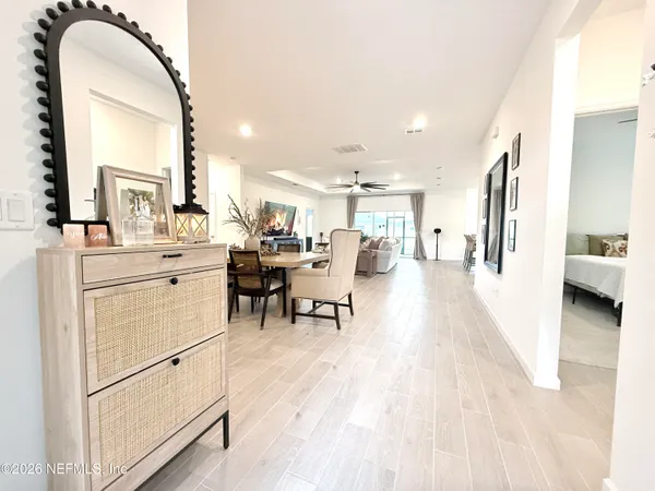 a living room with furniture and a table