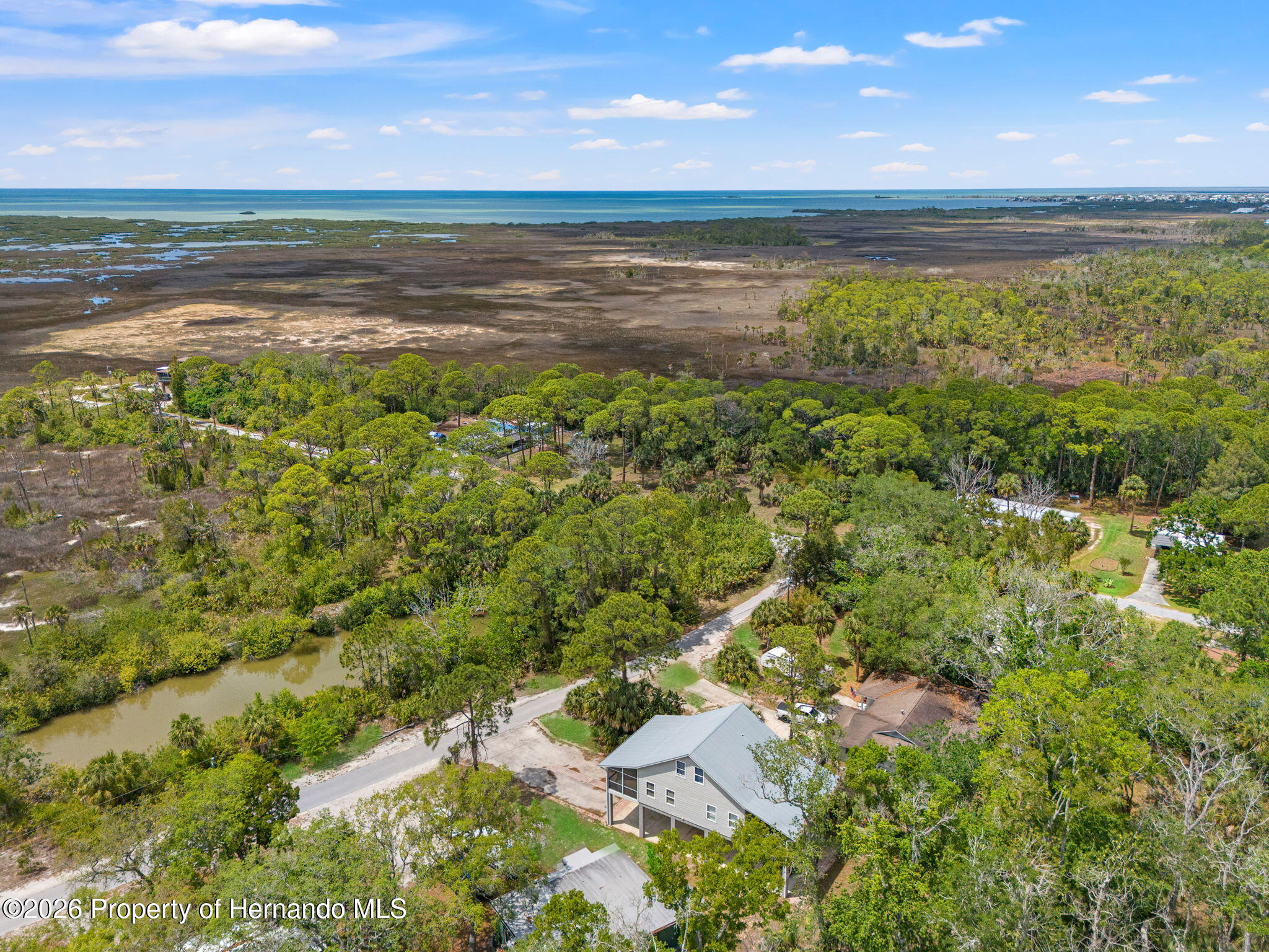 1566 Indian Bay Road Spring Hill, FL 34607 - Photo 52 of 56 a view of an ocean and a mountain