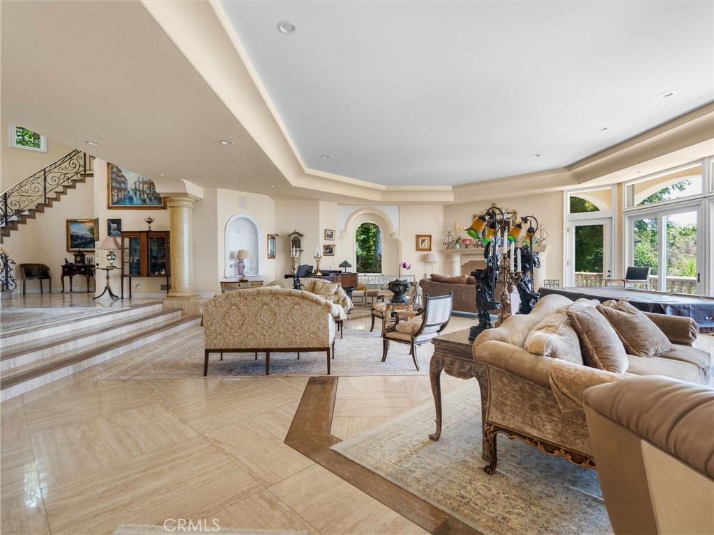 6000 Cavalleri Road Malibu, CA 90265 - Photo 18 of 44 a living room with furniture and a large window