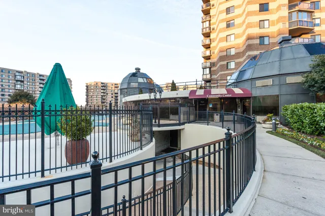 a view of a balcony with sitting area
