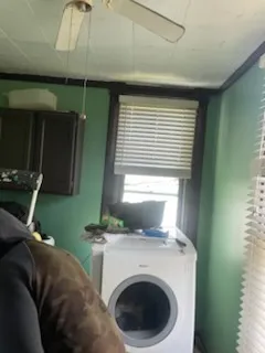 a bathroom with a shower and a sink