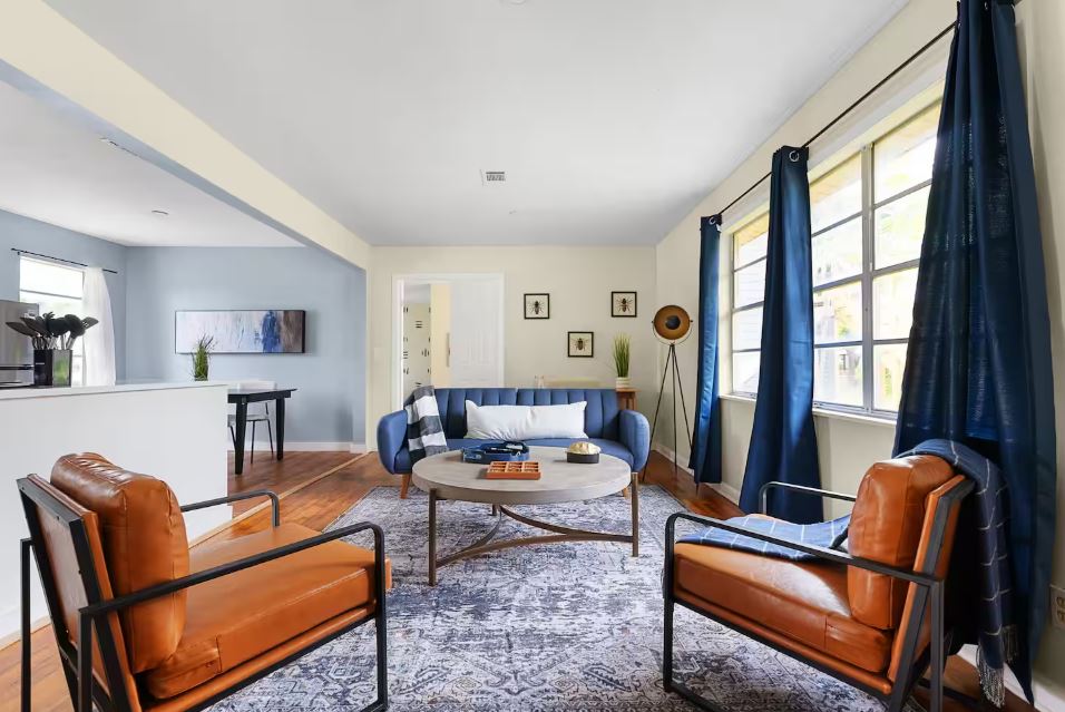 1100 Neans Drive Austin, TX 78758 - Photo 14 of 40 Living area with wood finished floors and baseboards