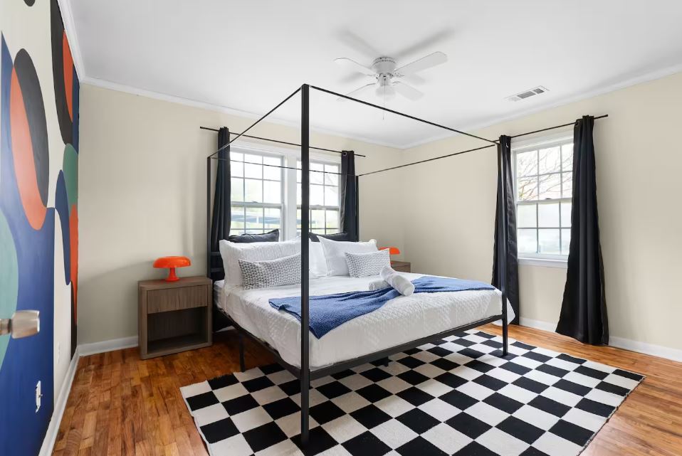 1100 Neans Drive Austin, TX 78758 - Photo 16 of 40 Bedroom featuring light wood finished floors, a ceiling fan, and ornamental molding