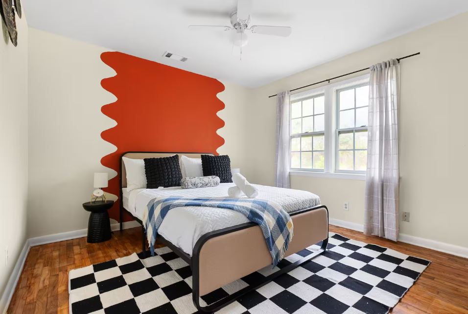 1100 Neans Drive Austin, TX 78758 - Photo 24 of 40 Bedroom featuring light wood finished floors and ceiling fan