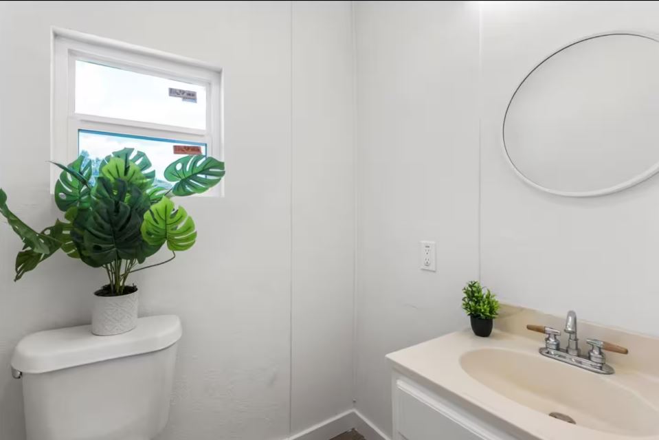 1100 Neans Drive Austin, TX 78758 - Photo 31 of 40 Bathroom with toilet and vanity