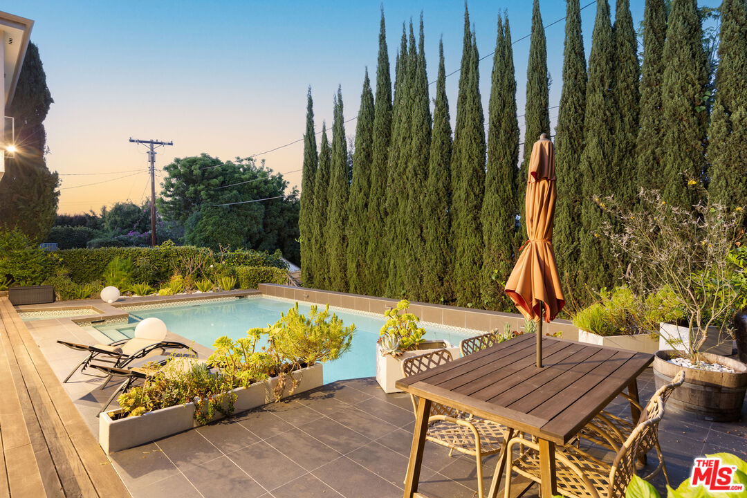 1256 Beverly Green Drive Beverly Hills, CA 90212 - Photo 1 of 1 swimming pool view with a seating space