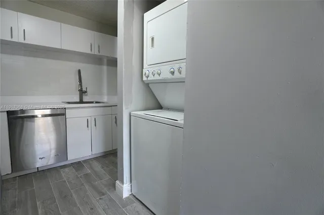 a kitchen with a stove and a refrigerator