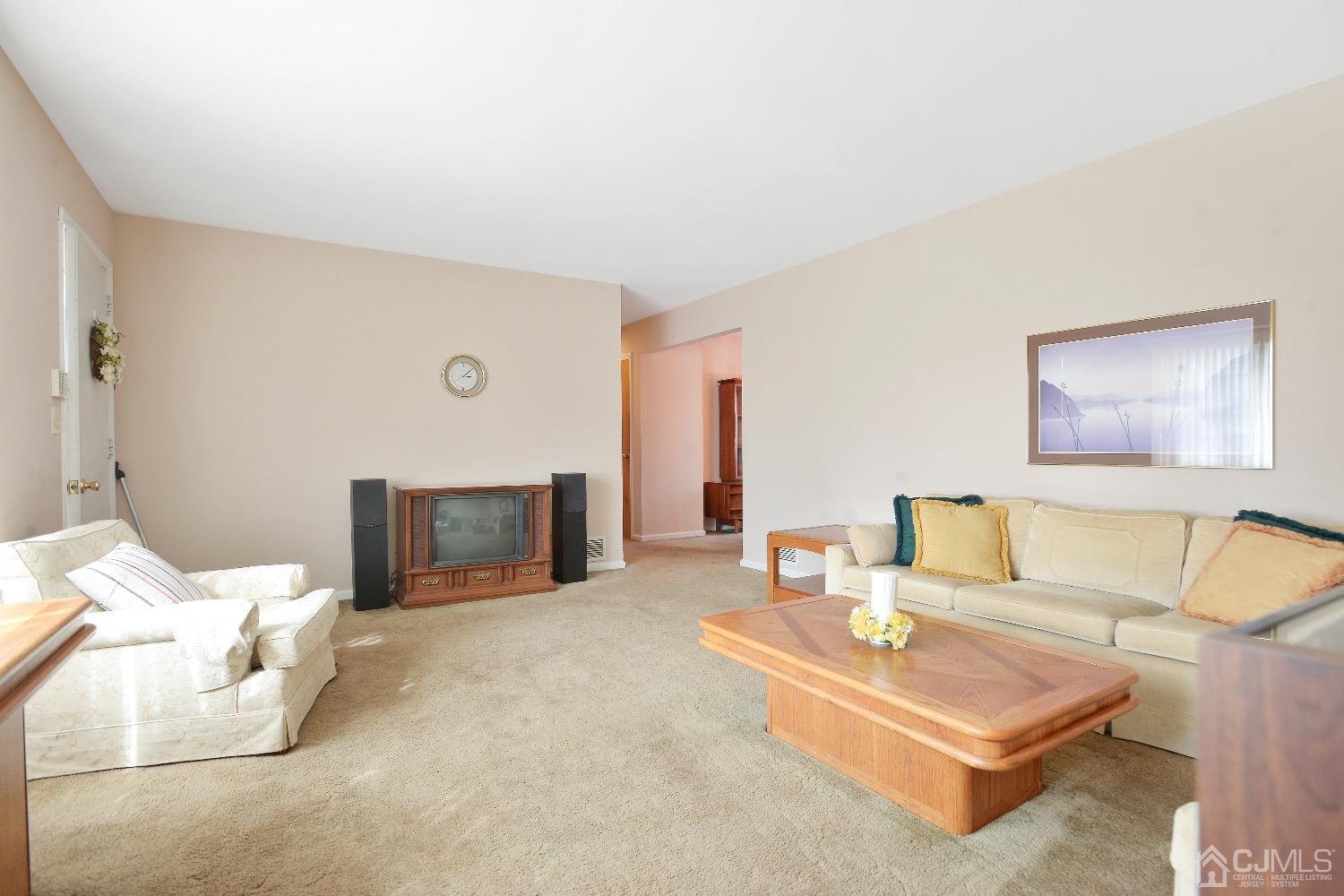 492 Plainfield Road Edison, NJ 08820 - Photo 8 of 20 a living room with furniture