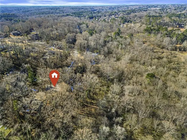 a view of a and trees in a field