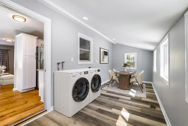 a view of livingroom with washer and dryer